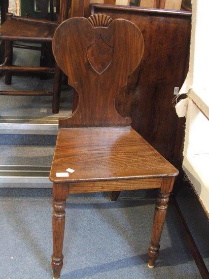 Appraisal: A SINGLE EARLY VICTORIAN OAK HALL CHAIR with shaped back