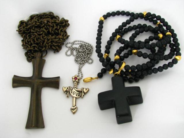 Appraisal: Lot of three cross crucifix necklaces consisting of DK Co