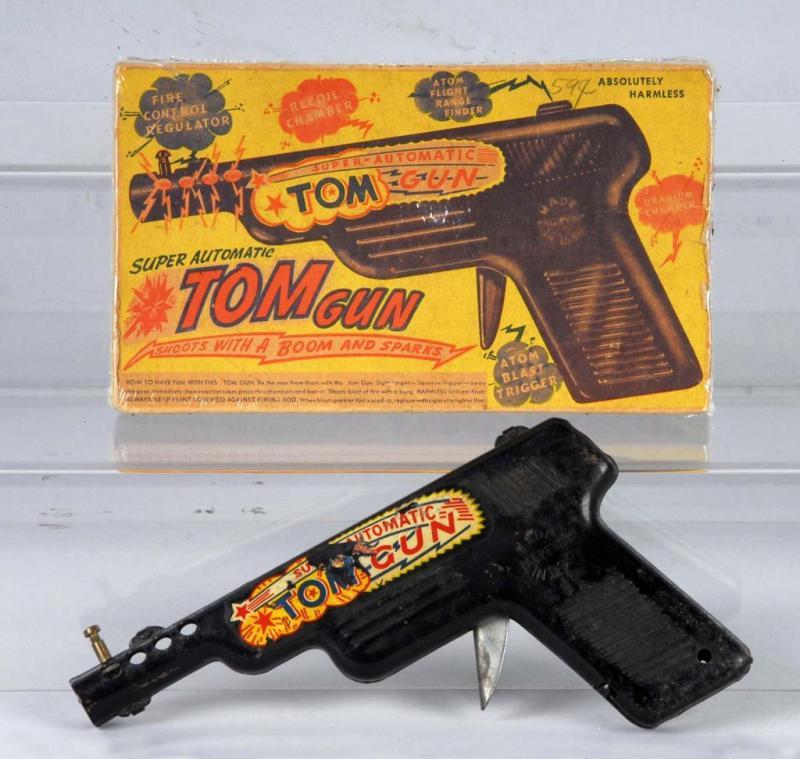 Appraisal: Super Automatic Tom Gun Description Gun does not spark or