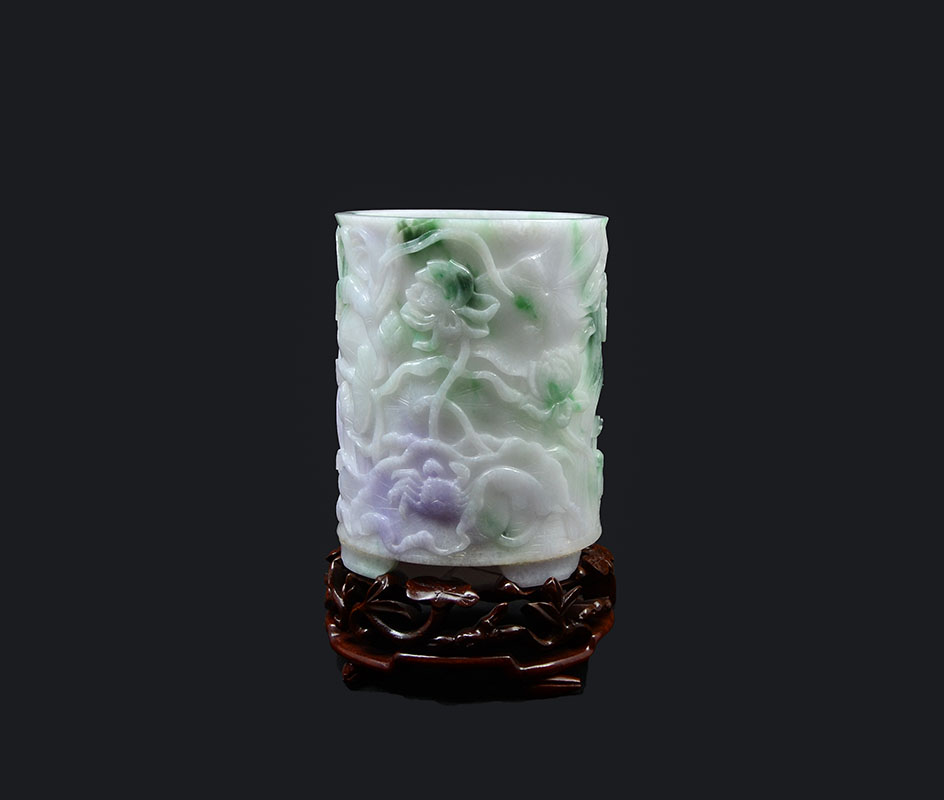 Appraisal: CHINESE CARVED JADEITE BRUSH POT Lavender apple green and white