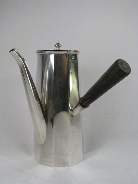 Appraisal: English sterling silver polygon shape coffee pot with wooden ebony