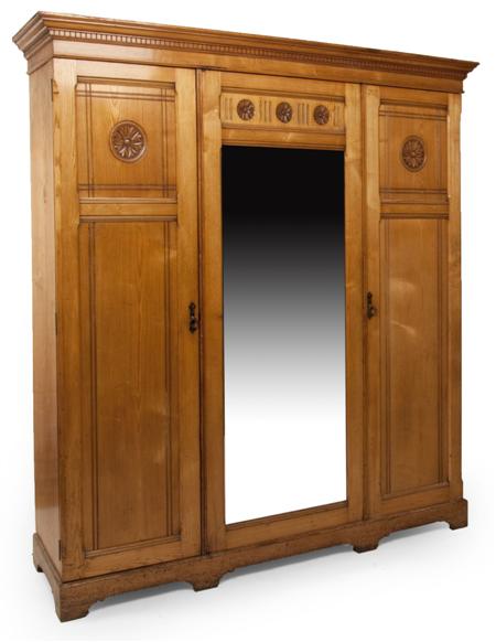 Appraisal: A Victorian pine two door wardrobe the dentil cornice over