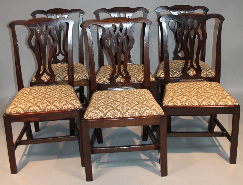 Appraisal: A set of six thC mahogany Chippendale design dining chairs