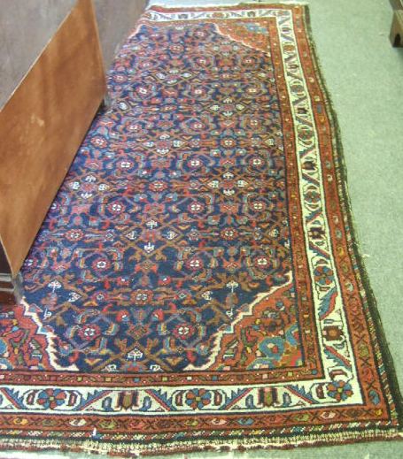 Appraisal: A Hamadan rug Persian the indigo field with a herate