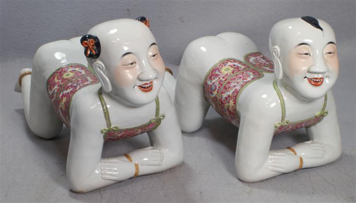 Appraisal: Chinese porcelain figural pillows approximately long th c damage to