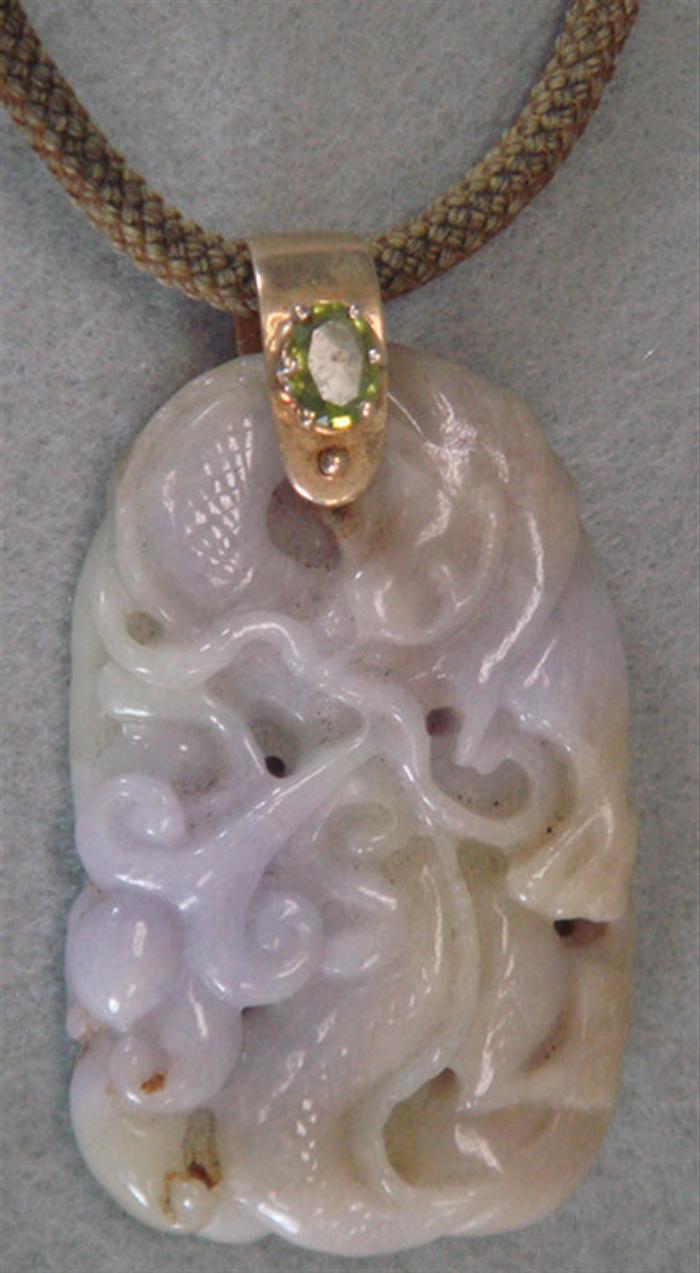 Appraisal: Carved Jade pendant depicting coiled serpant lavender and yellow green