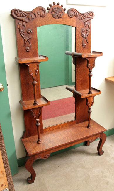 Appraisal: MIRRORED HALL SHELF Oak with a carved crest arched mirror