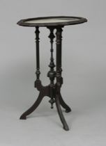 Appraisal: Victorian Curio Table Carved wood parlor table Features an oval