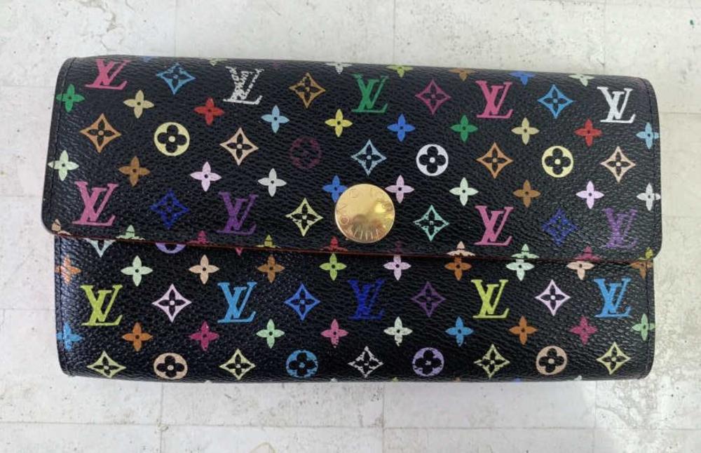 Appraisal: LOUIS VUITTON BLACK SARAH WALLETLouis Vuitton black Sarah wallet multicolor