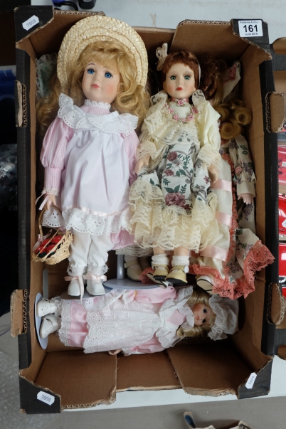 Appraisal: A collection of pottery dolls on stands