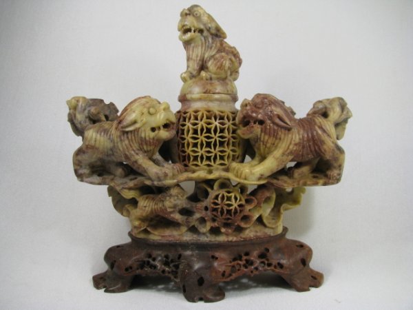 Appraisal: Well carved soap stone three piece figural group comprising three