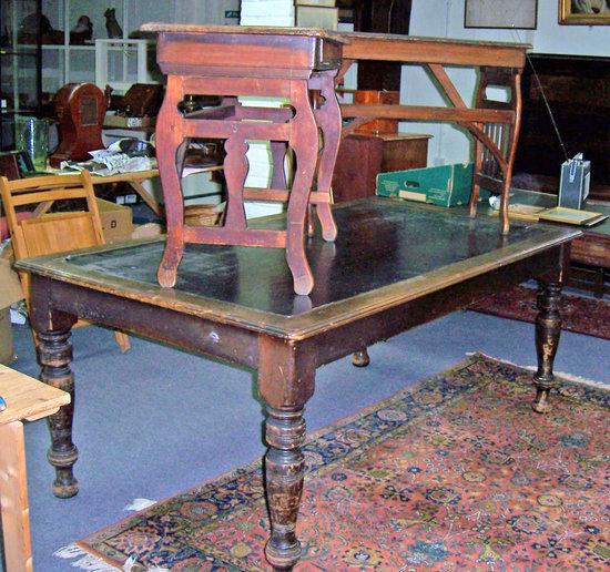 Appraisal: A large Edwardian writing table the rectangular top on turned