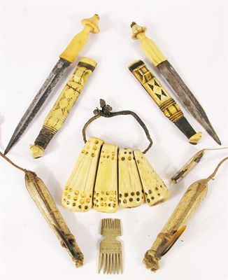 Appraisal: A small collection of Inuit marine ivory fishing equipment including