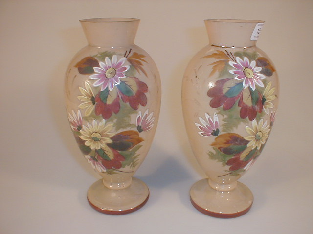 Appraisal: A pair of Victorian buff opaque glass vases of ovoid