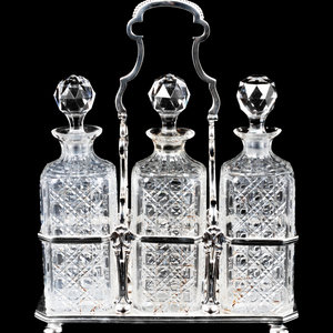 Appraisal: A Silver-Plate Decanter Set with three cut glass decanters Height