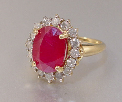 Appraisal: K CT RUBY AND CTW DIAMOND RING K yellow gold