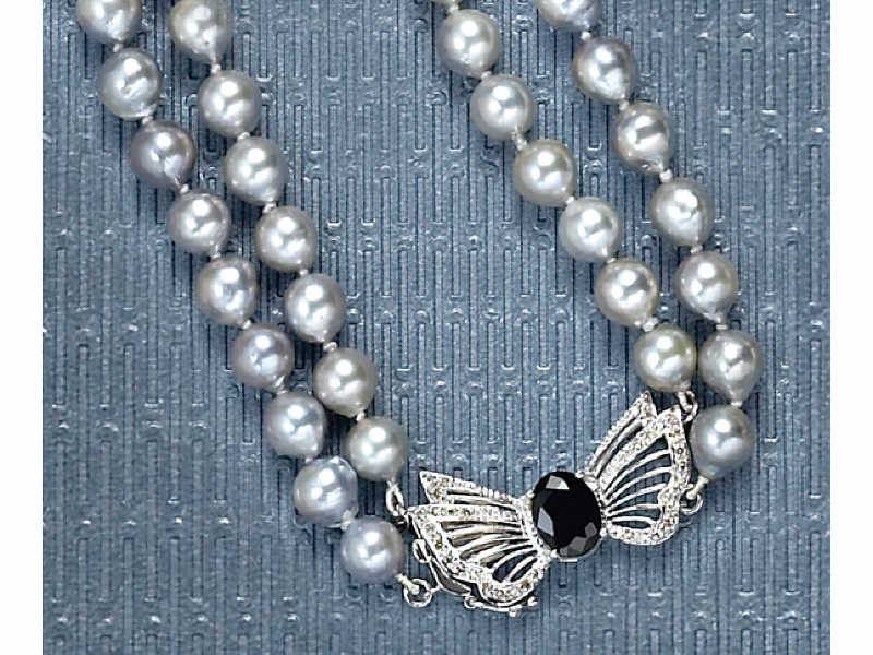 Appraisal: PEARL NECKLACE Silver grey color baroque pearls measuring mm with