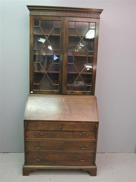 Appraisal: Early th century mahogany bureau bookcase in George II style