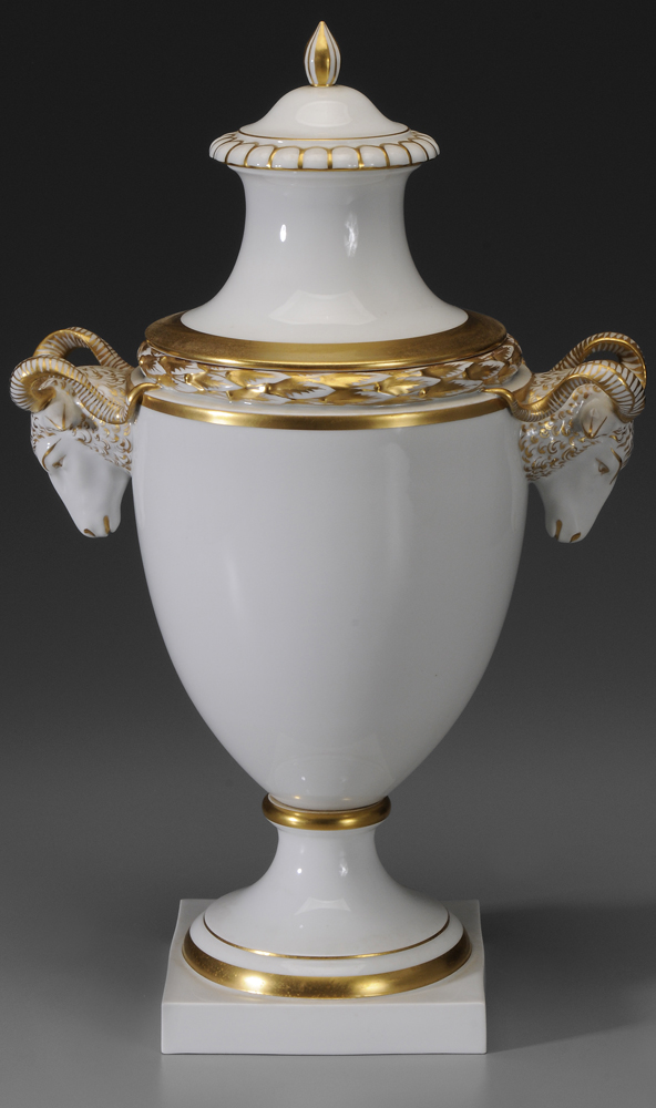 Appraisal: Porcelain Urn Gilt Highlights probably Austrian th century white-glazed porcelain