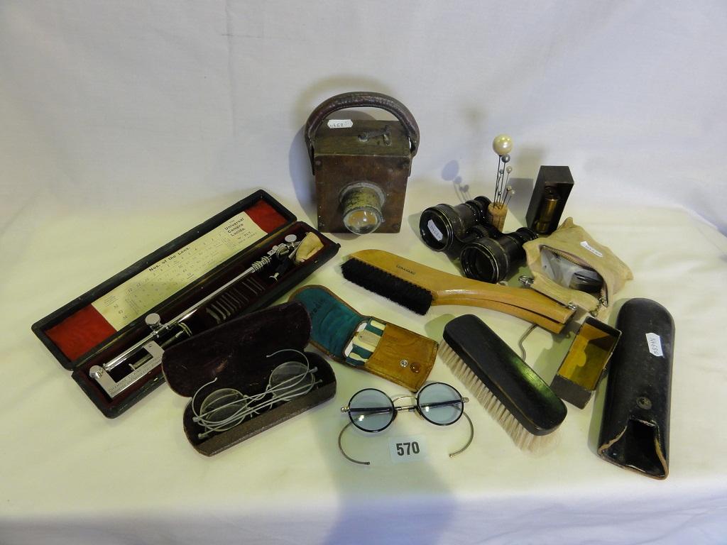 Appraisal: A miscellaneous collection of items including a pair of leather