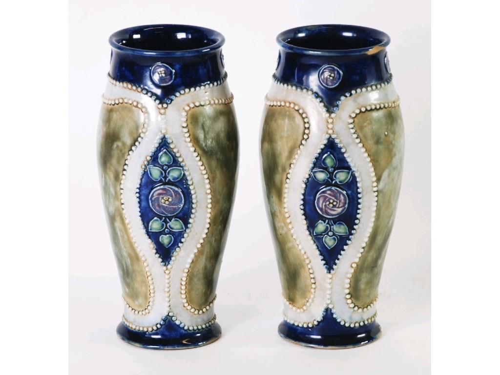 Appraisal: PAIR OF ROYAL DOULTON STONEWARE VASES footed oviform with lipped