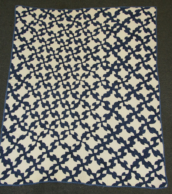 Appraisal: Hand stitched blue and white Drunkards Path quilt x Good