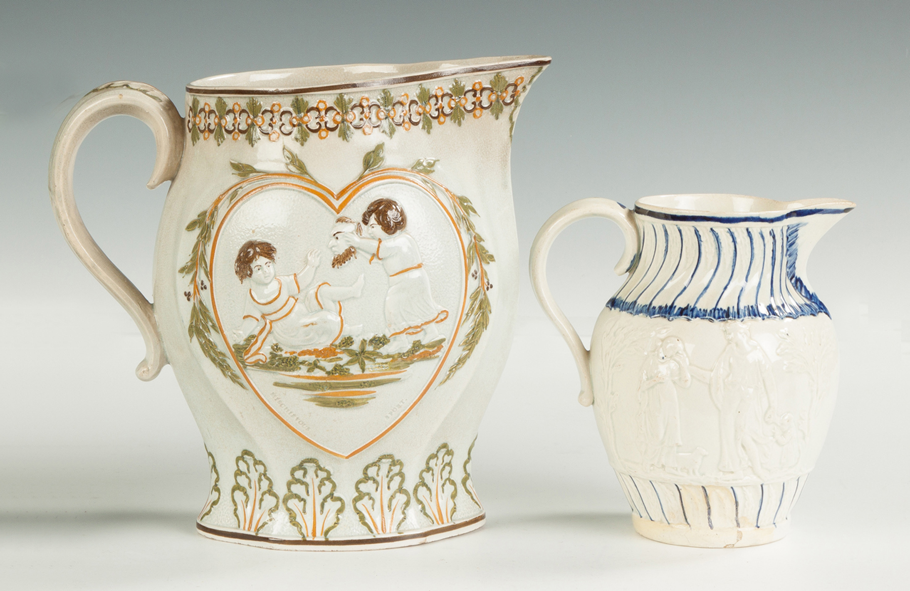 Appraisal: Two Pearlware Pitchers Early th cent Mischievous Sport Sportive Innocence