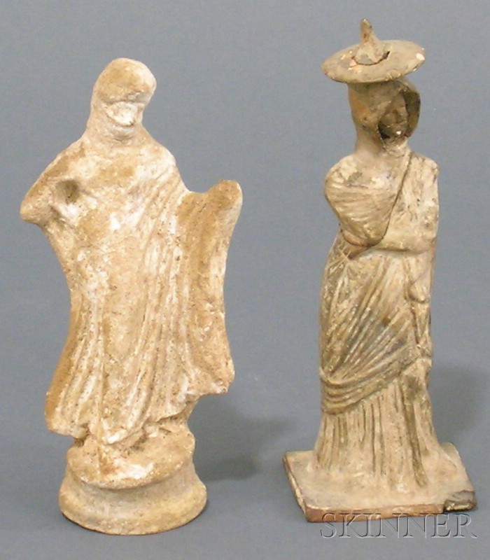 Appraisal: Two Greek Terra-cotta Tanagra Figures one modeled dancing ht the