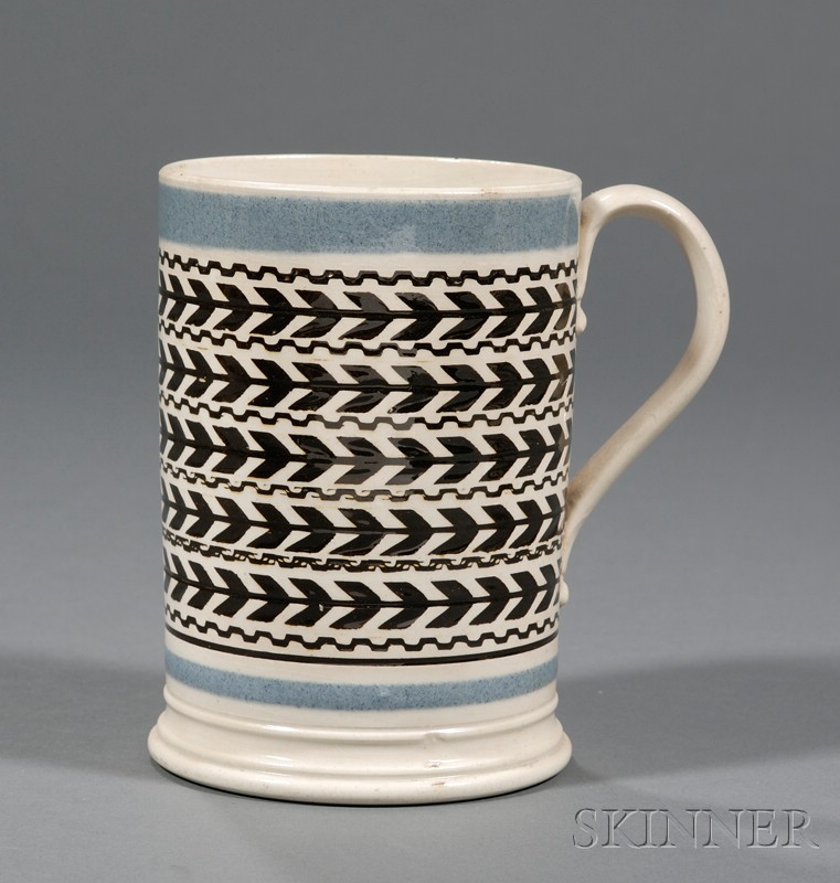 Appraisal: Mochaware Quart Mug Britain c with molded base light blue