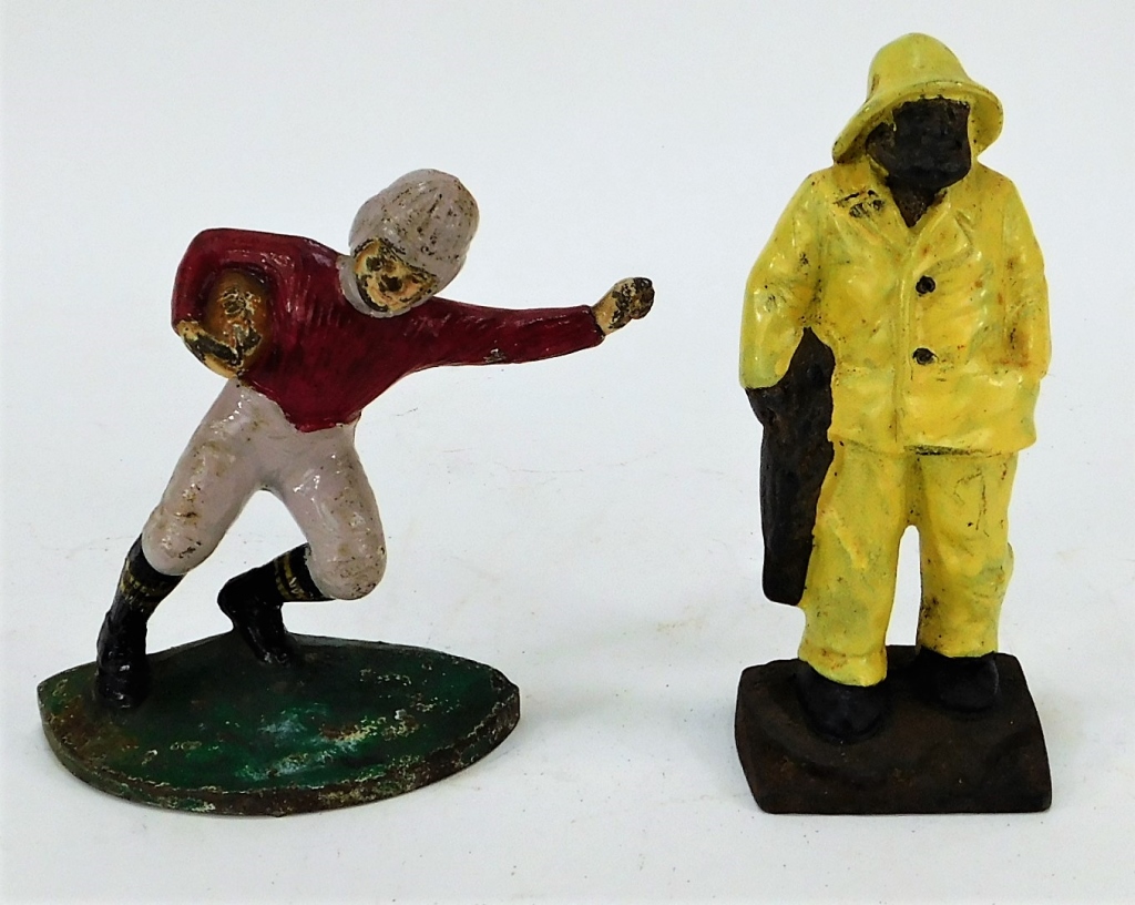 Appraisal: ANTIQUE CAST IRON FOOTBALL PLAYER FISHERMAN TOYS United States Early