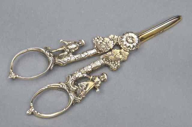 Appraisal: A PAIR OF GEORGE V SILVER GILT GRAPE SCISSORS the