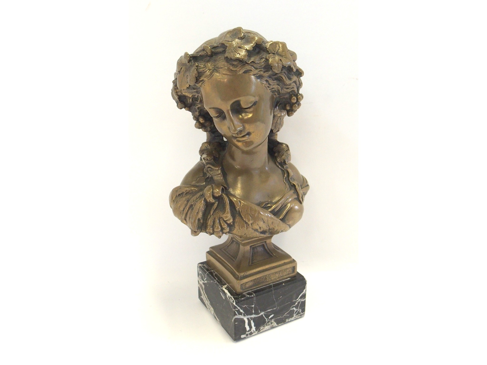 Appraisal: Bronzed resin bust of a classical woman