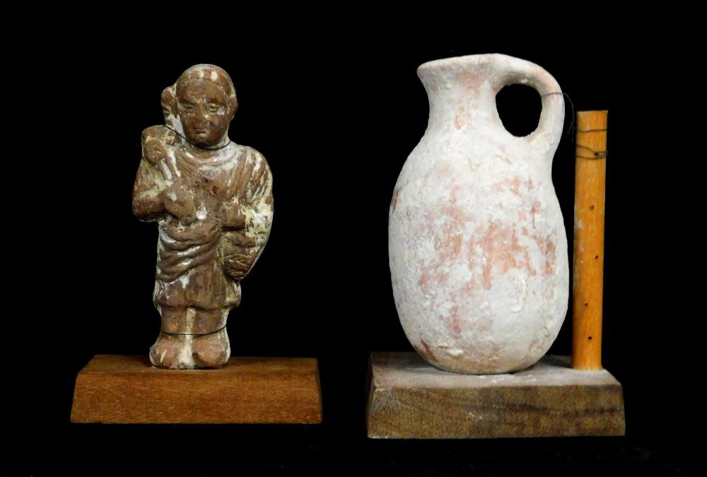 Appraisal: ANTIQUITY Ancient Terracotta figure and vessel mounted on stands Roman