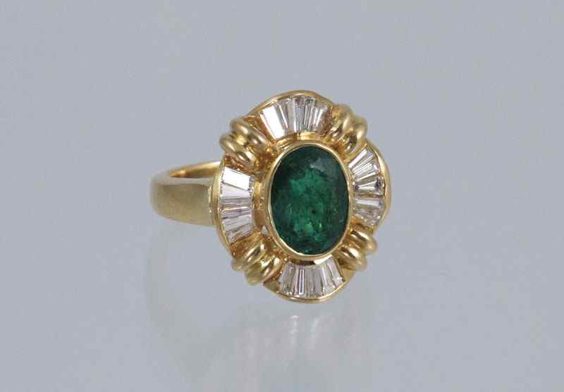 Appraisal: K GOLD EMERALD AND DIAMOND RING K yellow gold ring