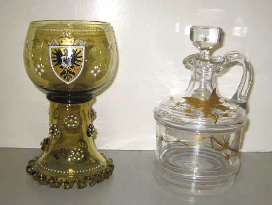 Appraisal: GERMAN GLASS ROMER AND DECANTER Amber glass Romer with conical