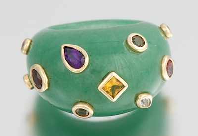 Appraisal: A Carved Jade Bombe Ring with Gemstones Carved jade bombe