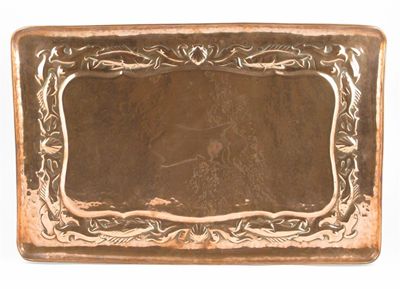 Appraisal: A large Newlyn copper tray rectangular section hammered in relief