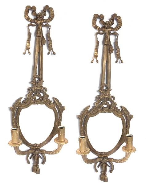 Appraisal: A pair of gilt bronze two light girandoles height in