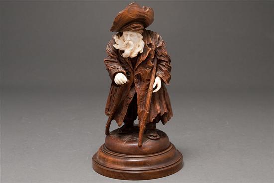 Appraisal: Continental carved ivory and wood figure of a lame beggar