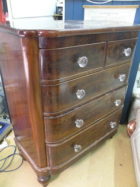 Appraisal: A Victorian mahogany bow front chest of two short and