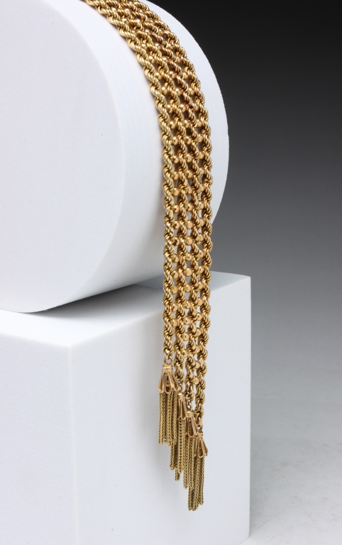 Appraisal: nd half - th century Unusual yellow gold -strand wide