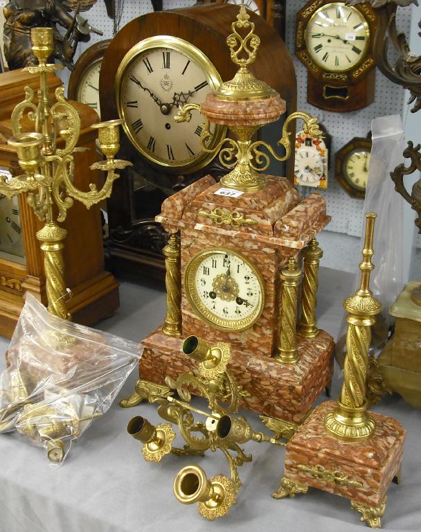 Appraisal: Decorative French pink marble mantel clock garniture the Vincenti movement