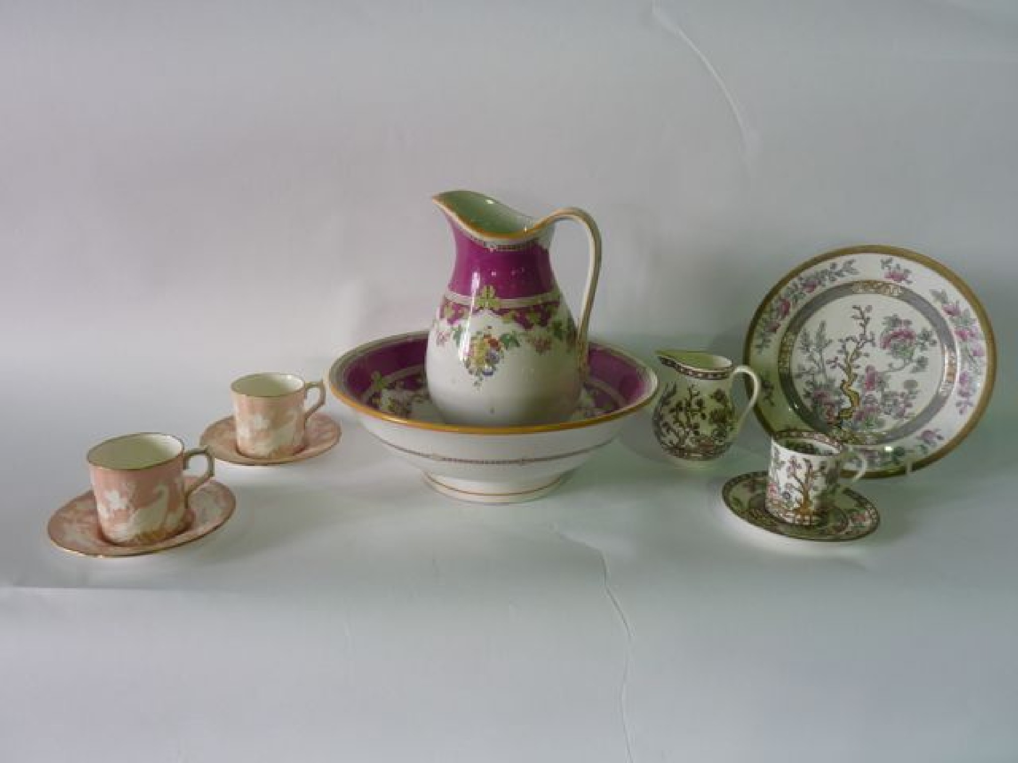 Appraisal: A collection of Coalport coffee cans and saucers in the