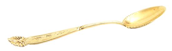 Appraisal: GOLD Tiffany Co demitasse spoon K yellow gold shell-form crest