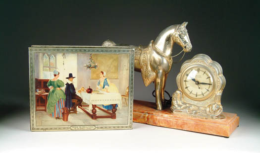 Appraisal: BISCUIT TIN AND FIGURAL HORSE CLOCK The rectangular h x