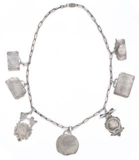 Appraisal: A Vintage Sterling Silver Luggage Tag and Charm Necklace dwts