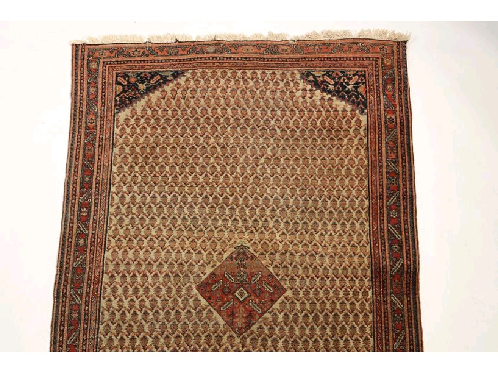 Appraisal: A PERSIAN RUG of Shiraz type the ivory ground worked