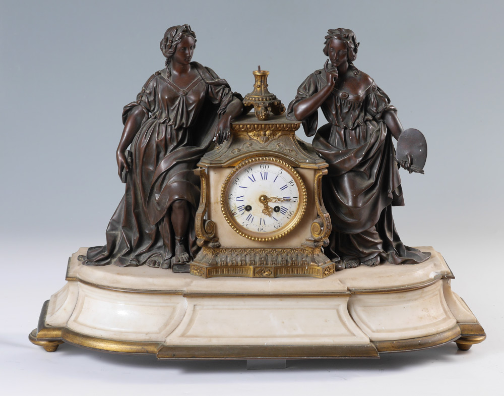 Appraisal: A PROJECT BRONZE MARBLE FIGURAL MANTLE CLOCK A nice clock