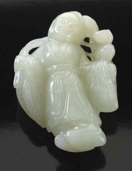 Appraisal: Chinese Qing carved jade figuredepicting a lady holding a lotus