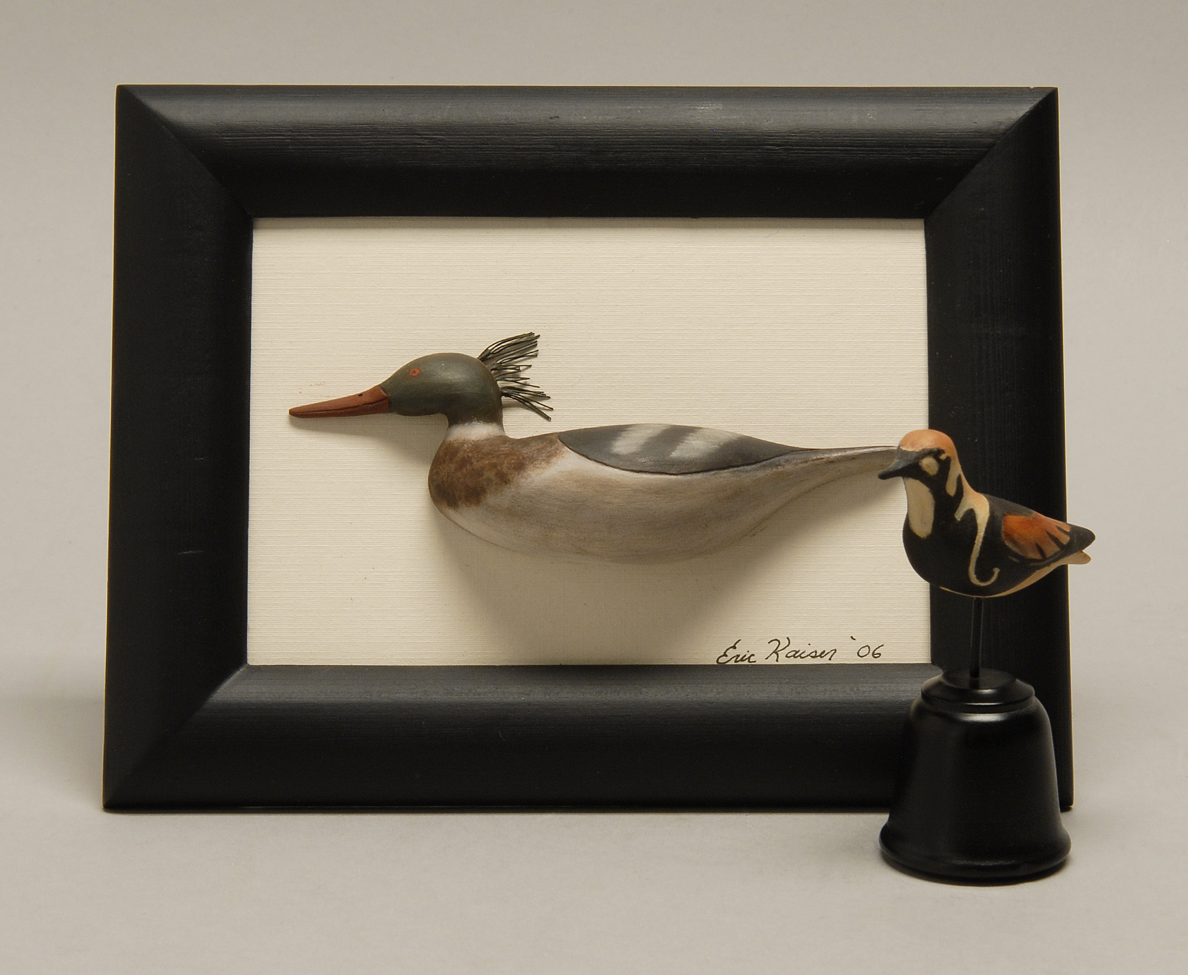 Appraisal: TWO MINIATURE BIRD CARVINGS A ruddy turnstone and a silhouette